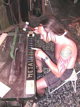56_hammering_the_frets_into_the_board