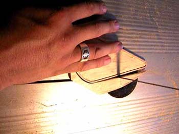 60_sawing_wood_to_cover_the_electronic_space