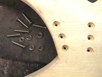 82_drilles_holes_for_screwing_the_neck_to_the_body